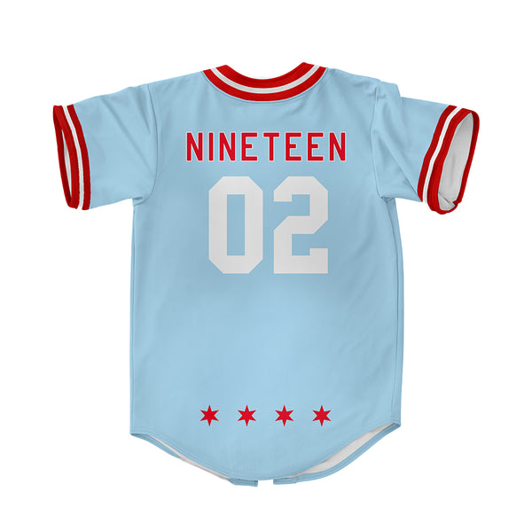 back of baseball jersey with word nineteen, numbers zero two, and four stars on it